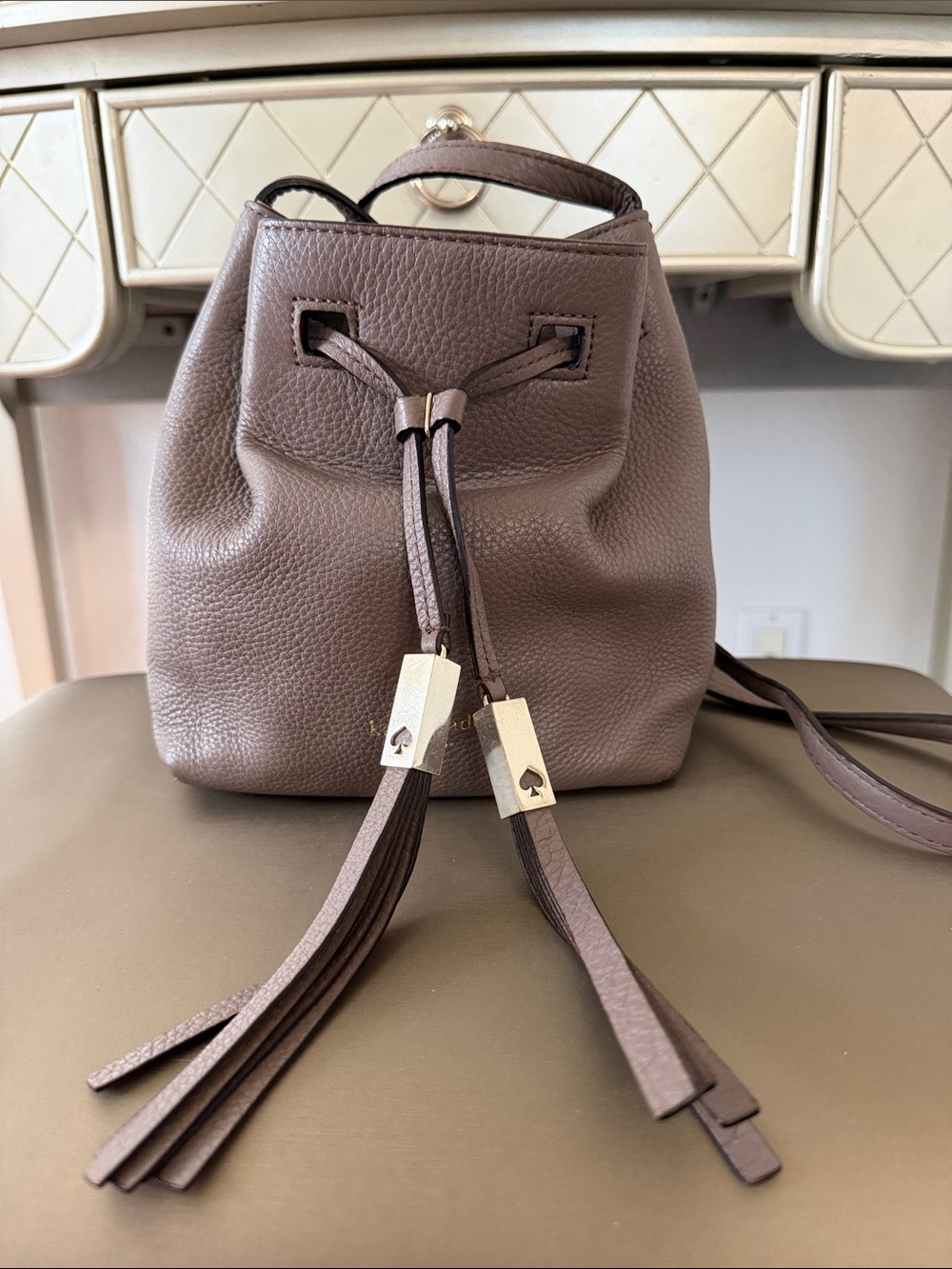 Kate Spade Pebbled Leather Drawstring Bucket Bag in Taupe
